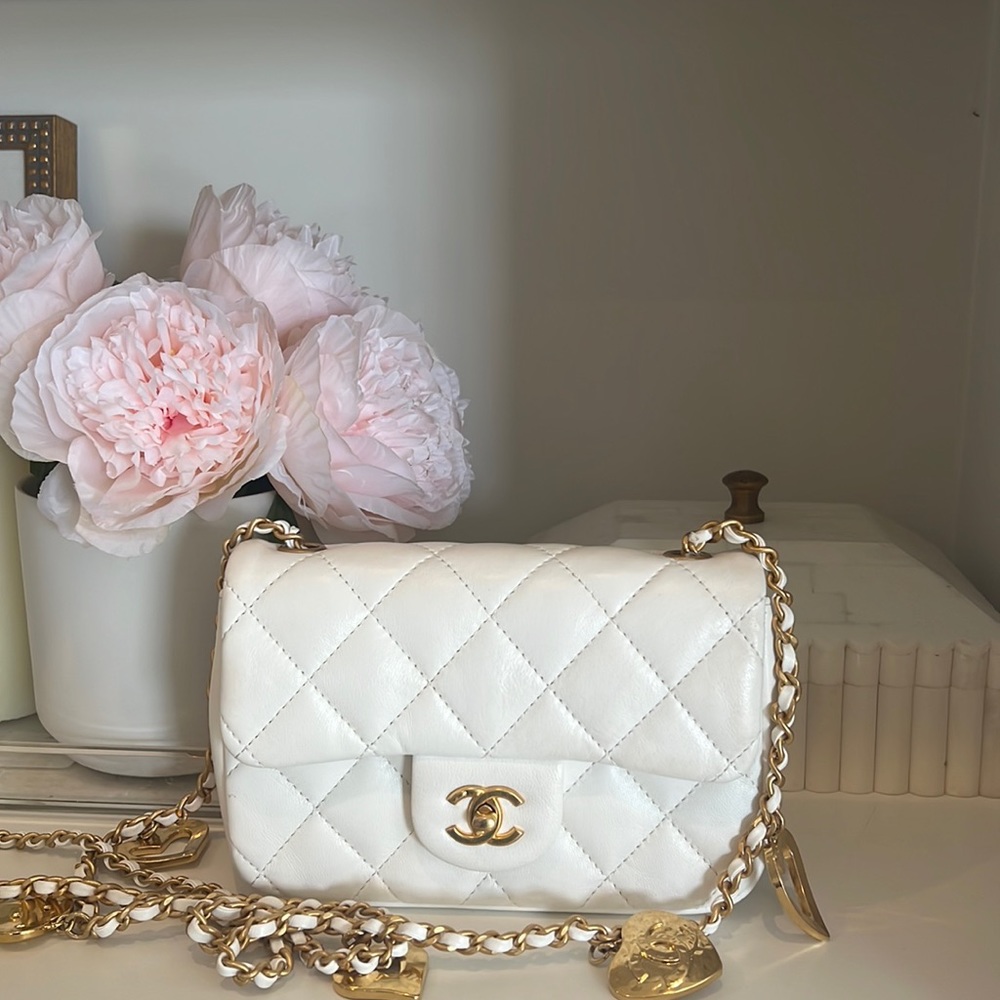Chanel mini handbag. Box and receipt included. Worn once.